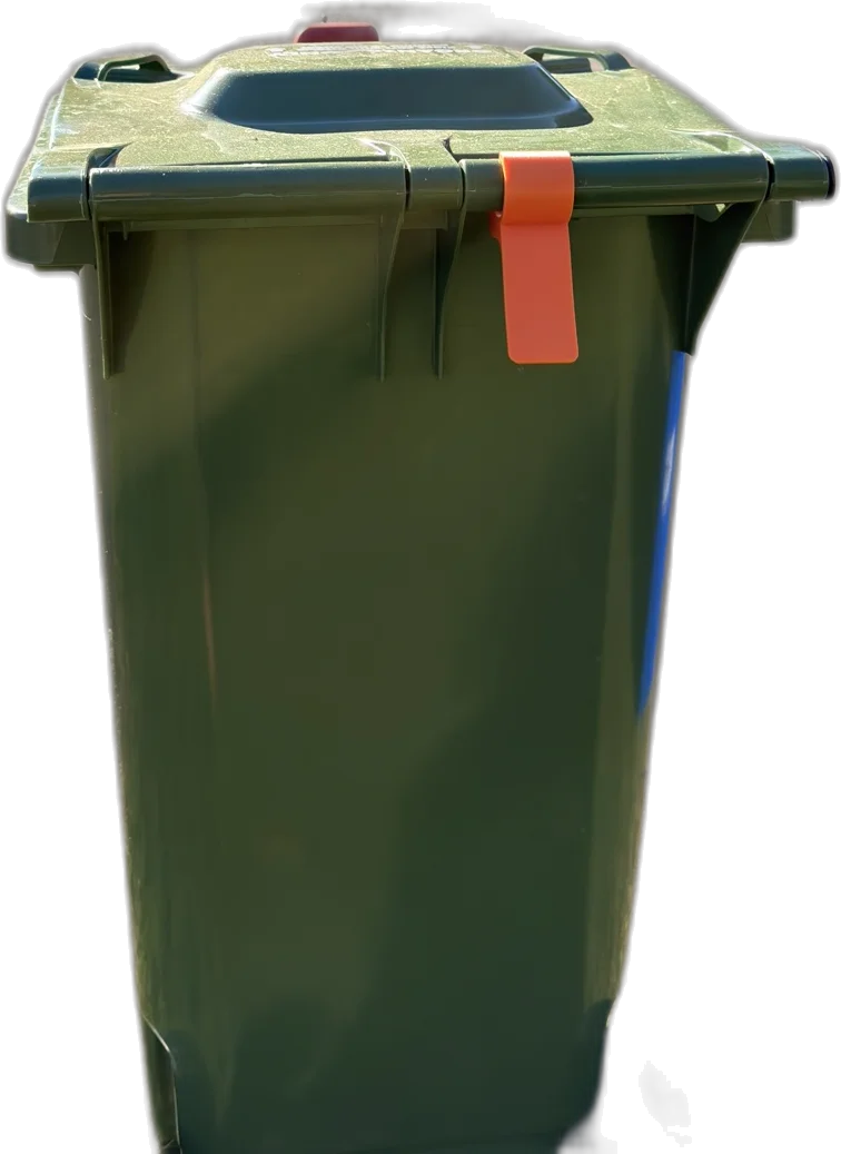 A bright orange BinGone flag hanging down over the front of a green garbage cart